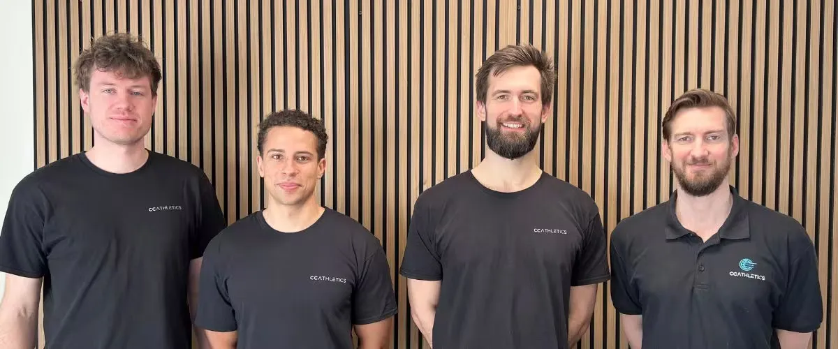 The CC Athletics team — four people in their workshop in Odense
